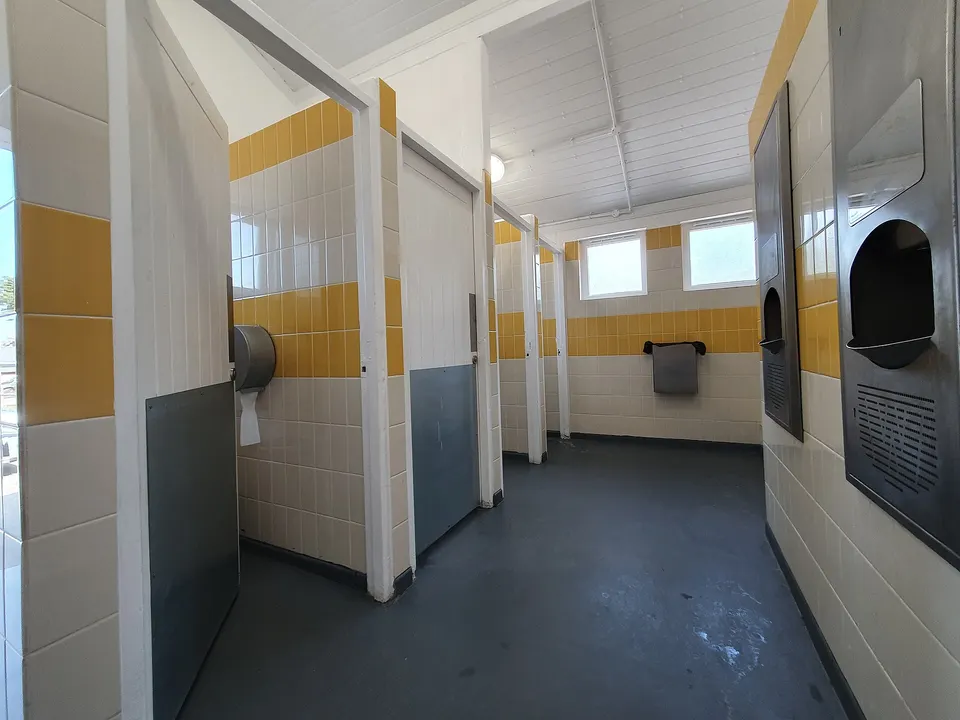 Row of toilet cubicles in a public washroom