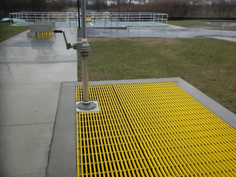 Yellow moulded fibreglass grating panel