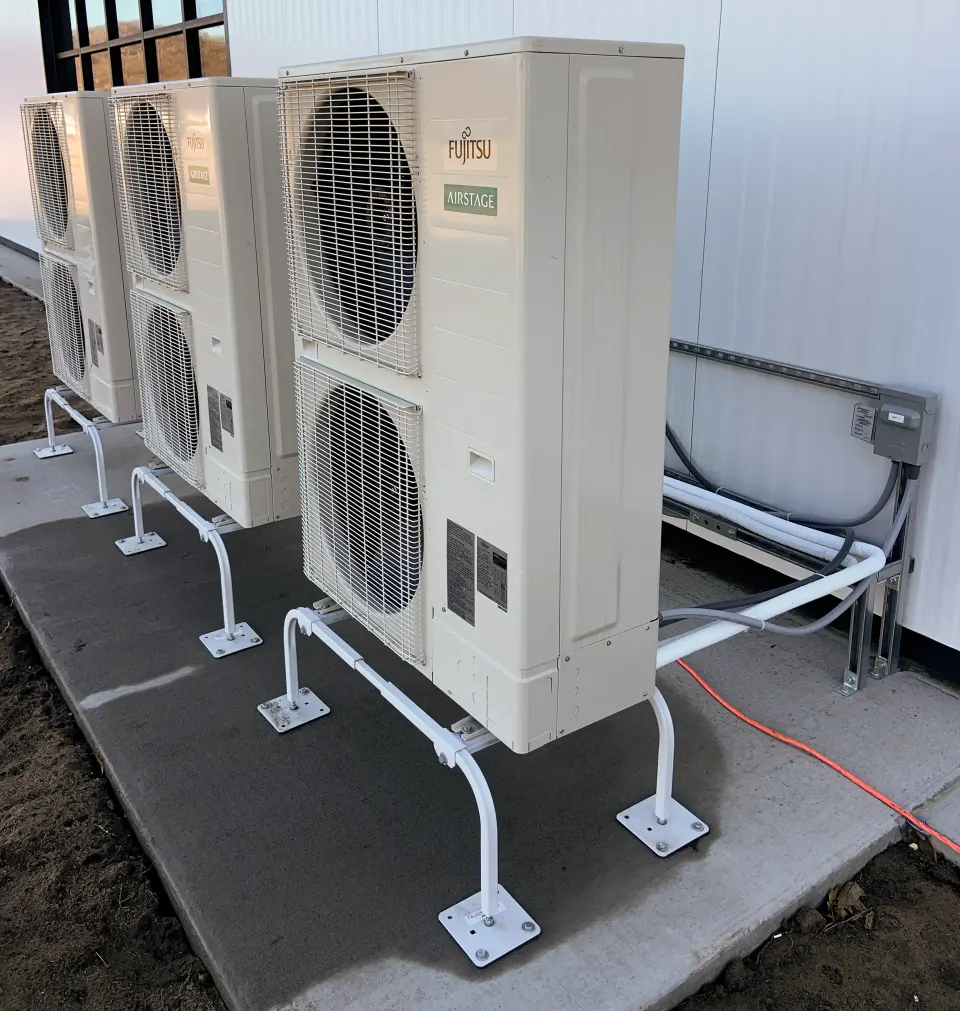 Outdoor units raised on ground stands