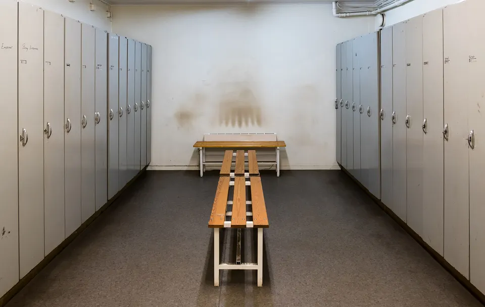 Changing room with lockers and bench
